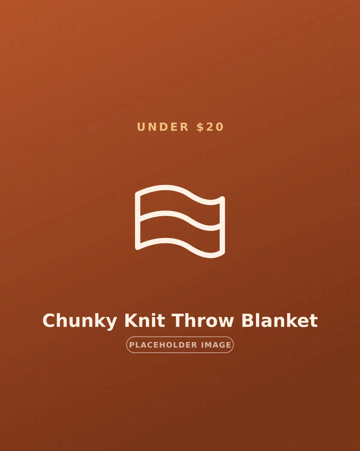 Chunky knit fall throw blanket draped over an apartment-sized sofa