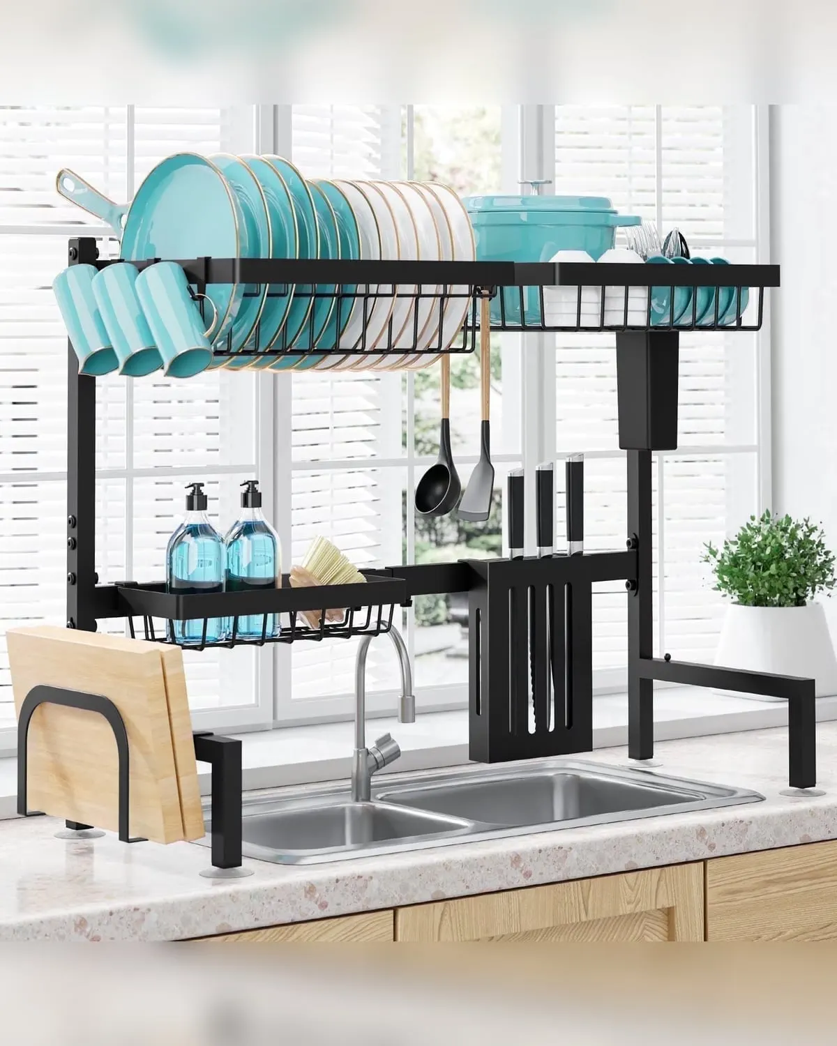 Black stainless steel over-the-sink dish drying rack above a kitchen sink