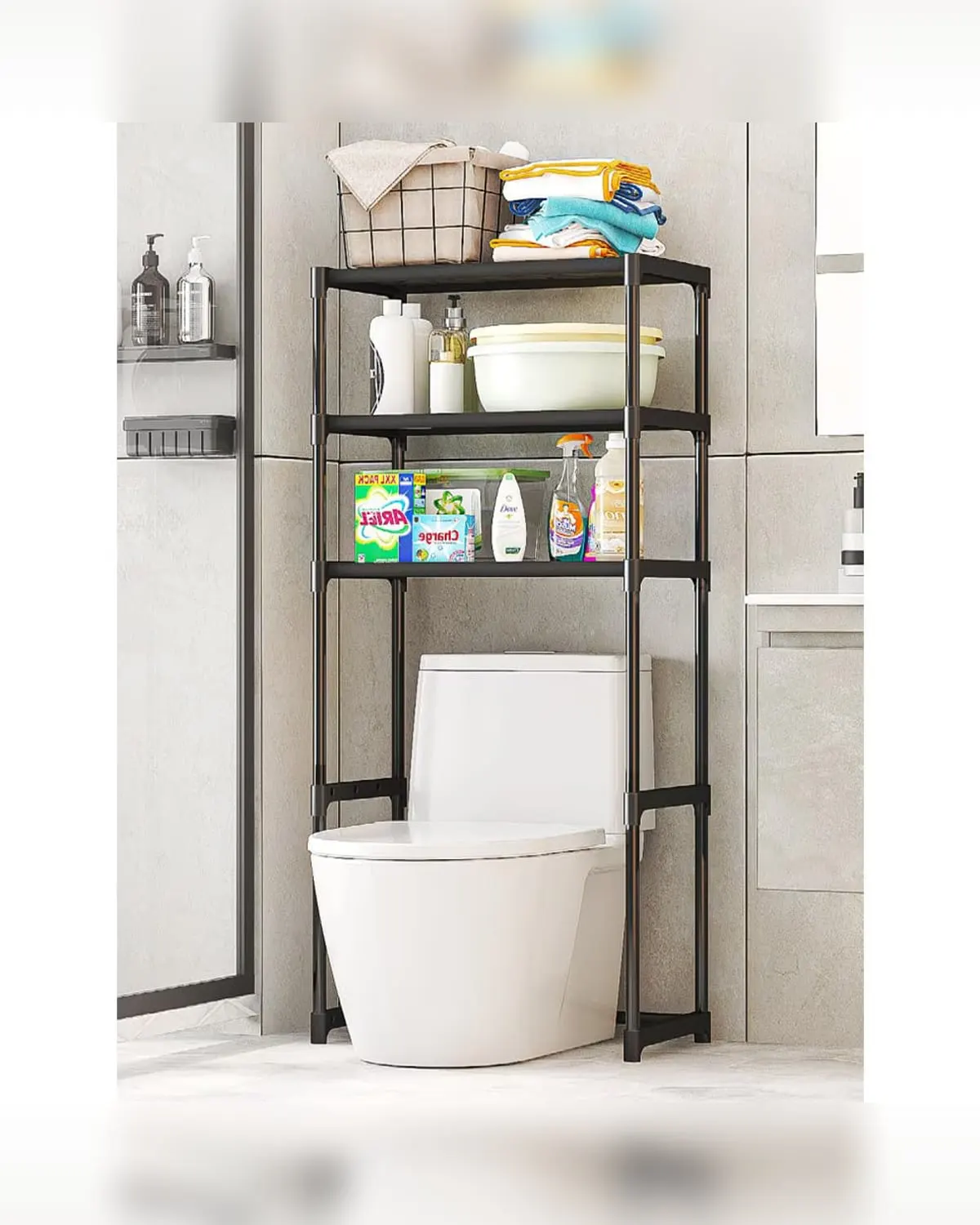 Black three-tier freestanding storage rack standing over a toilet in a small bathroom