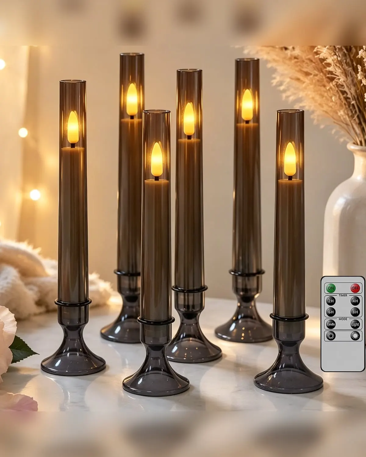 Set of six black flameless flickering LED taper candles with remote