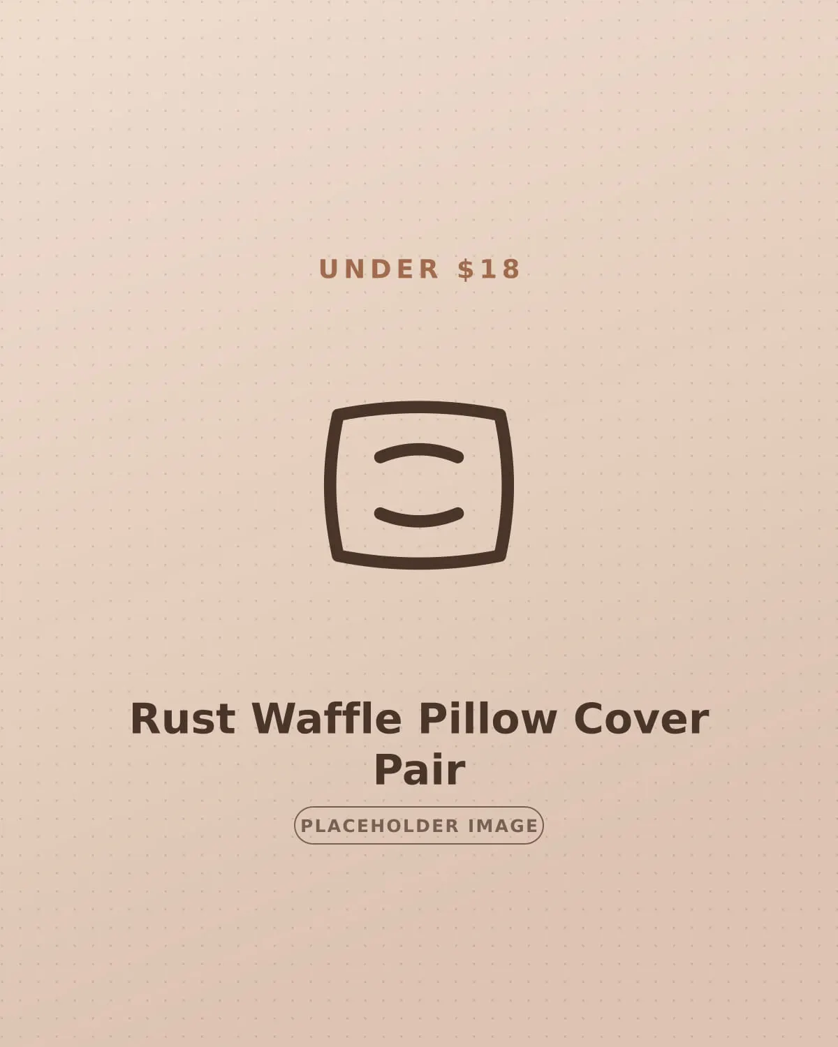 Pair of rust waffle-weave pillow covers on a small apartment sofa for autumn