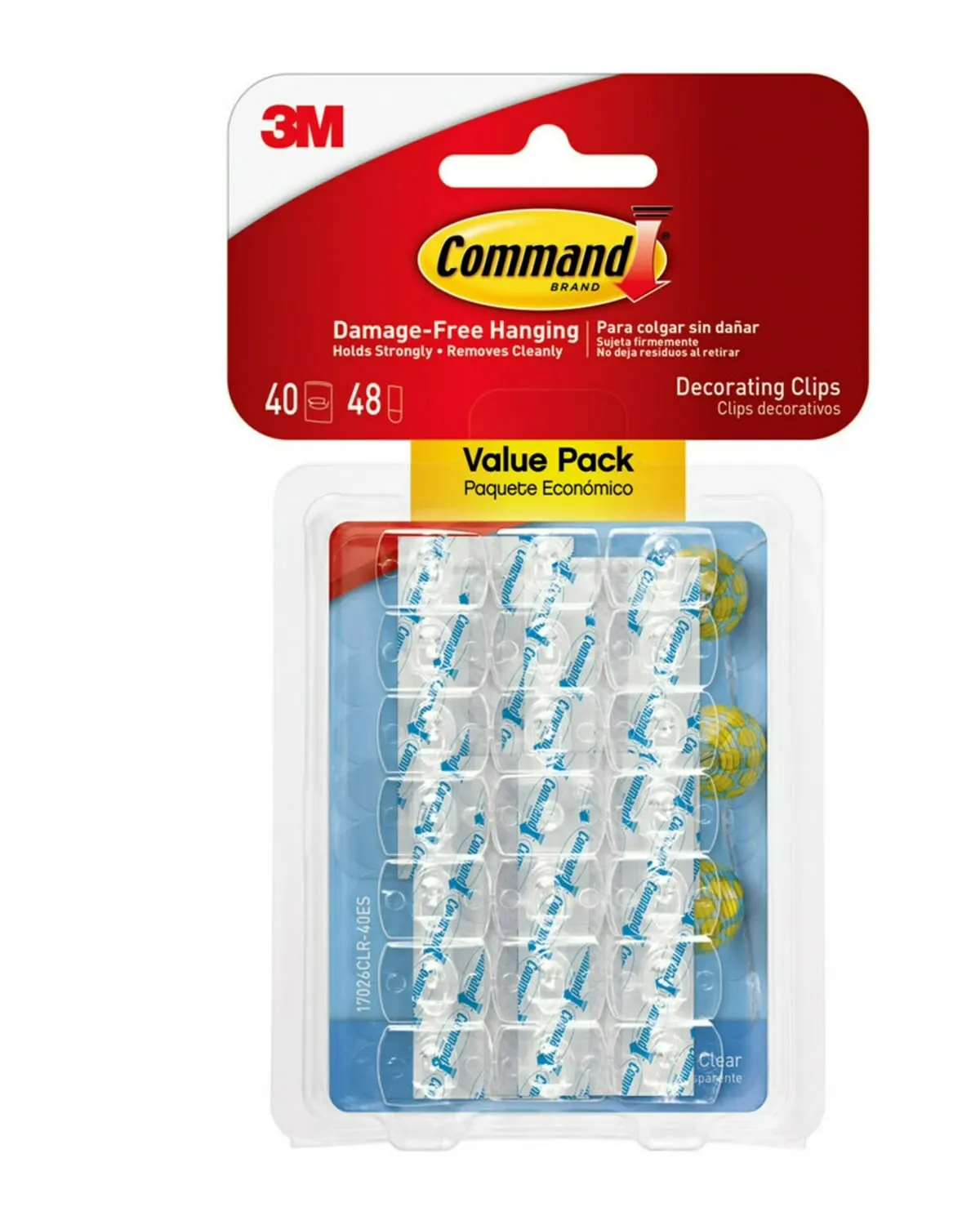 Clear adhesive light clips holding string lights along a wall