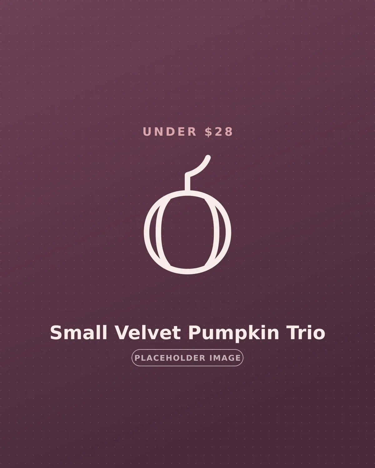 Trio of small handmade velvet pumpkins in rust and plum on a coffee table in a small apartment