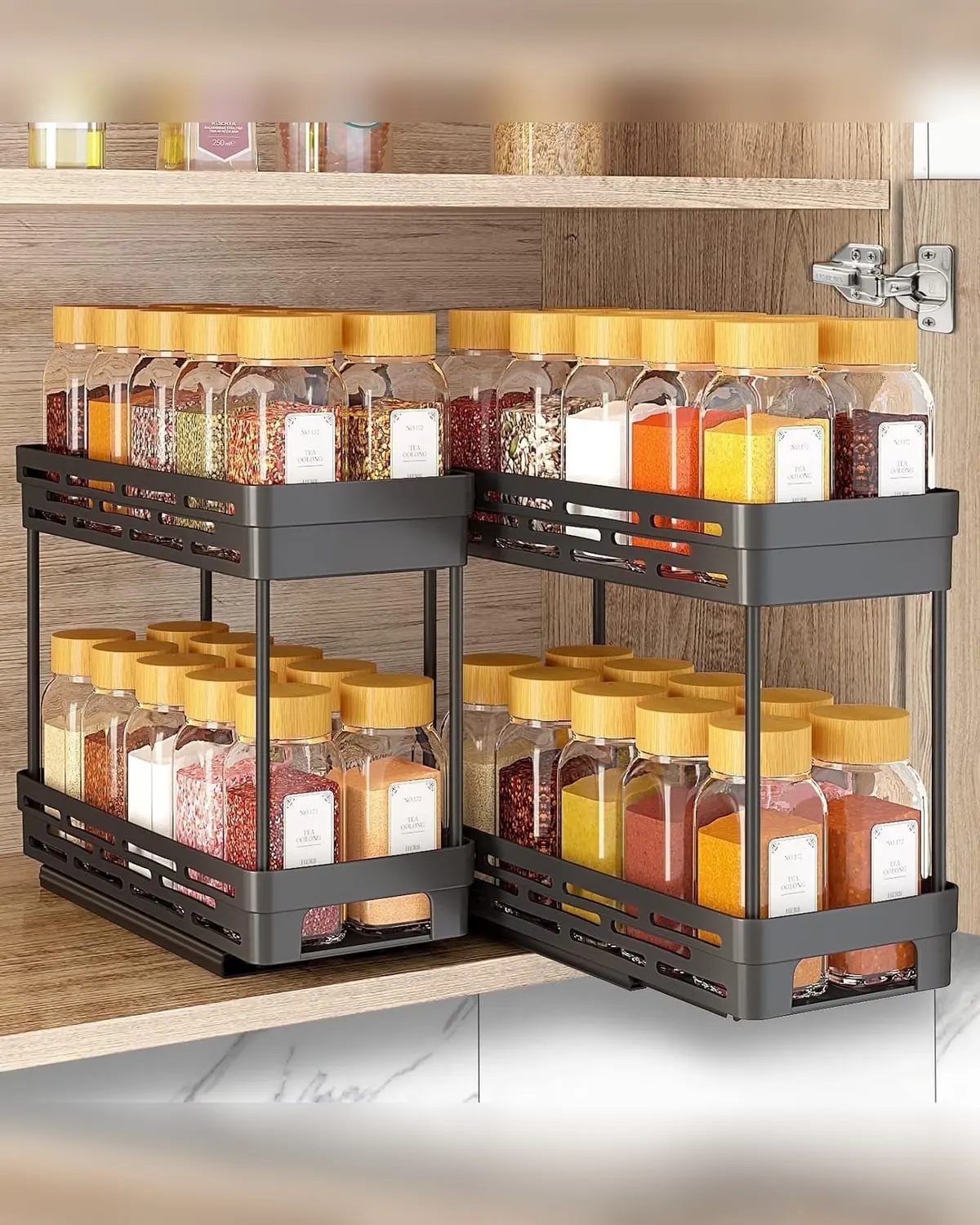 Black pull-out spice rack organizer sliding out of a kitchen cabinet