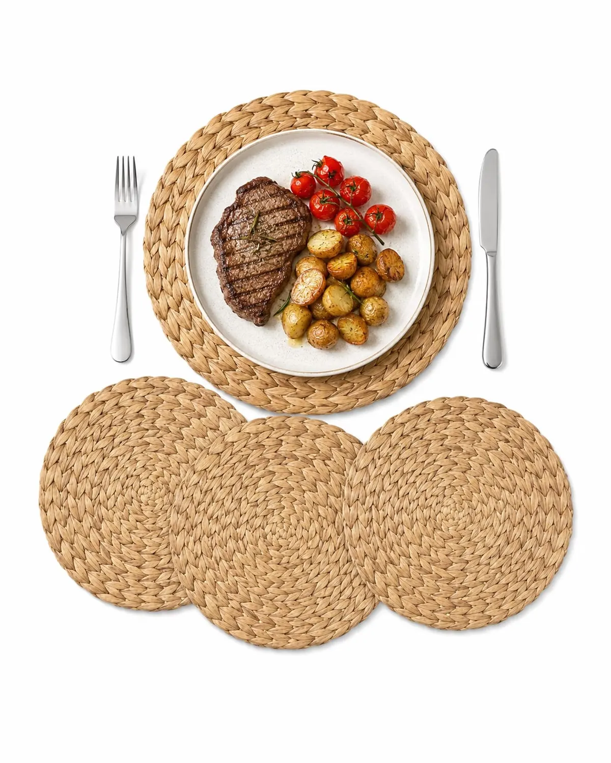 Round natural woven placemats under plates on a small dining table