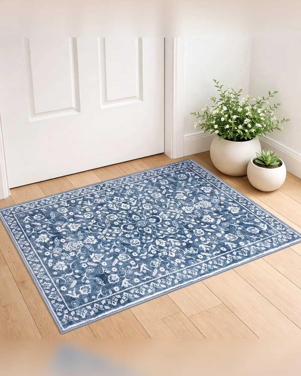 Small washable area rug in front of a kitchen sink