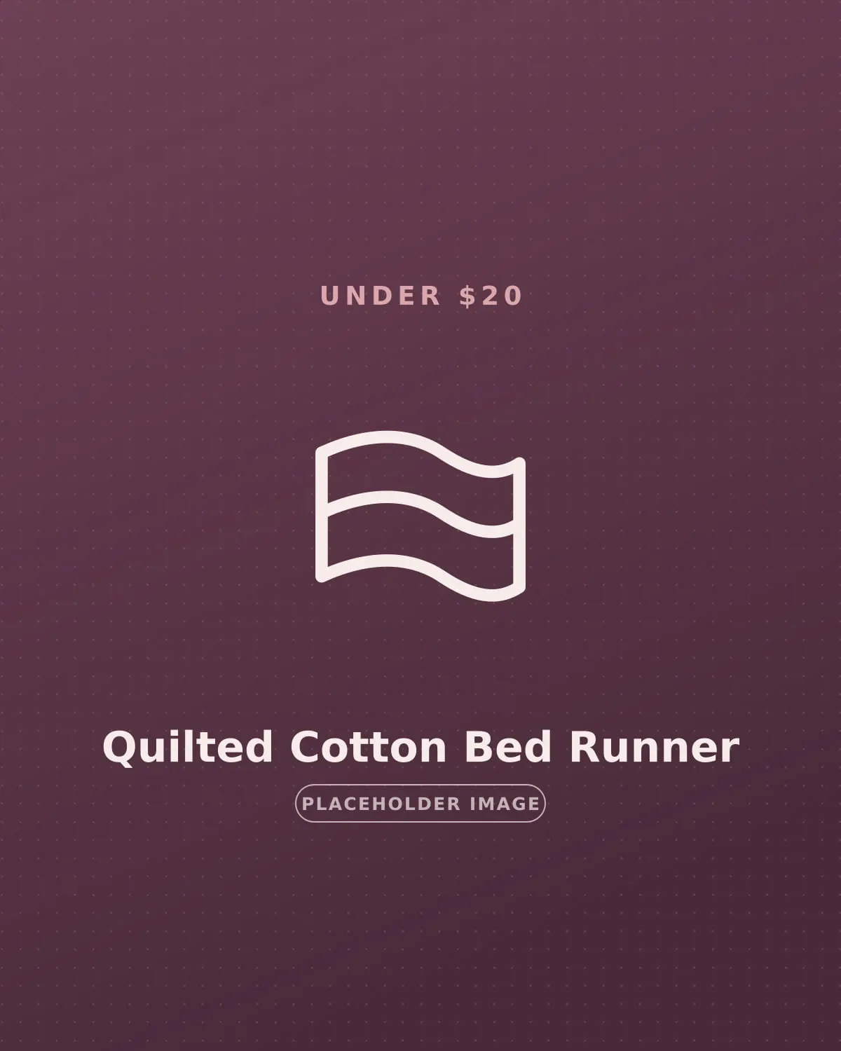Quilted cotton bed runner across the foot of a bed in a studio apartment