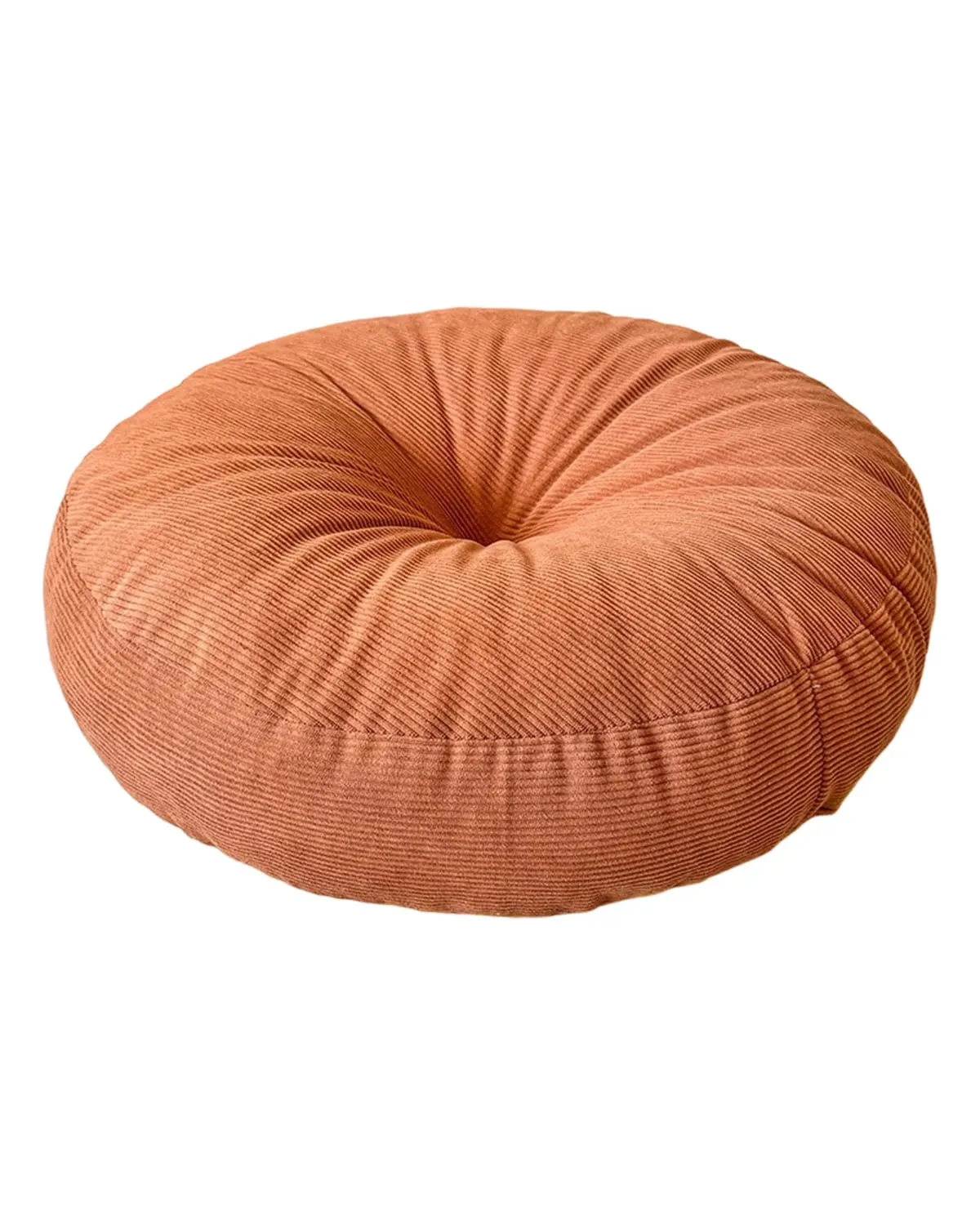 Round corduroy floor cushion pouf used as extra seating