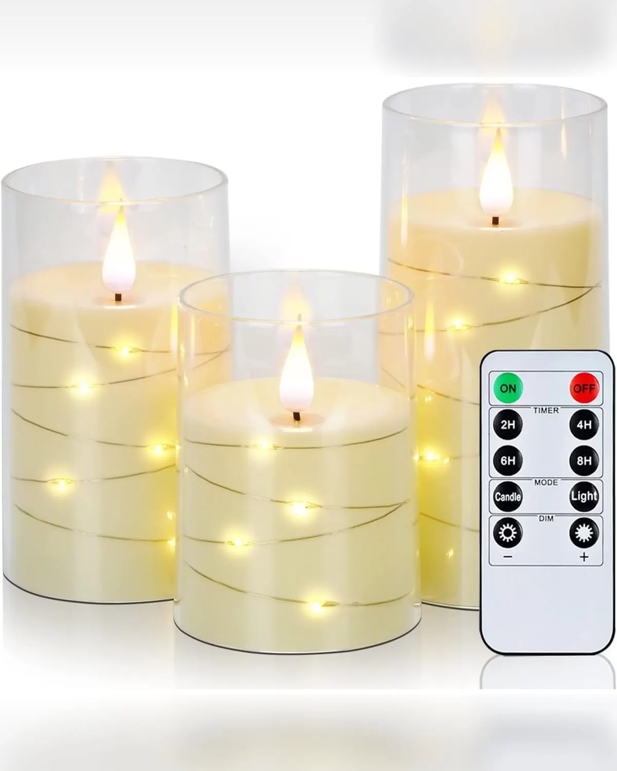 Flameless LED pillar candles with fairy lights glowing on a shelf