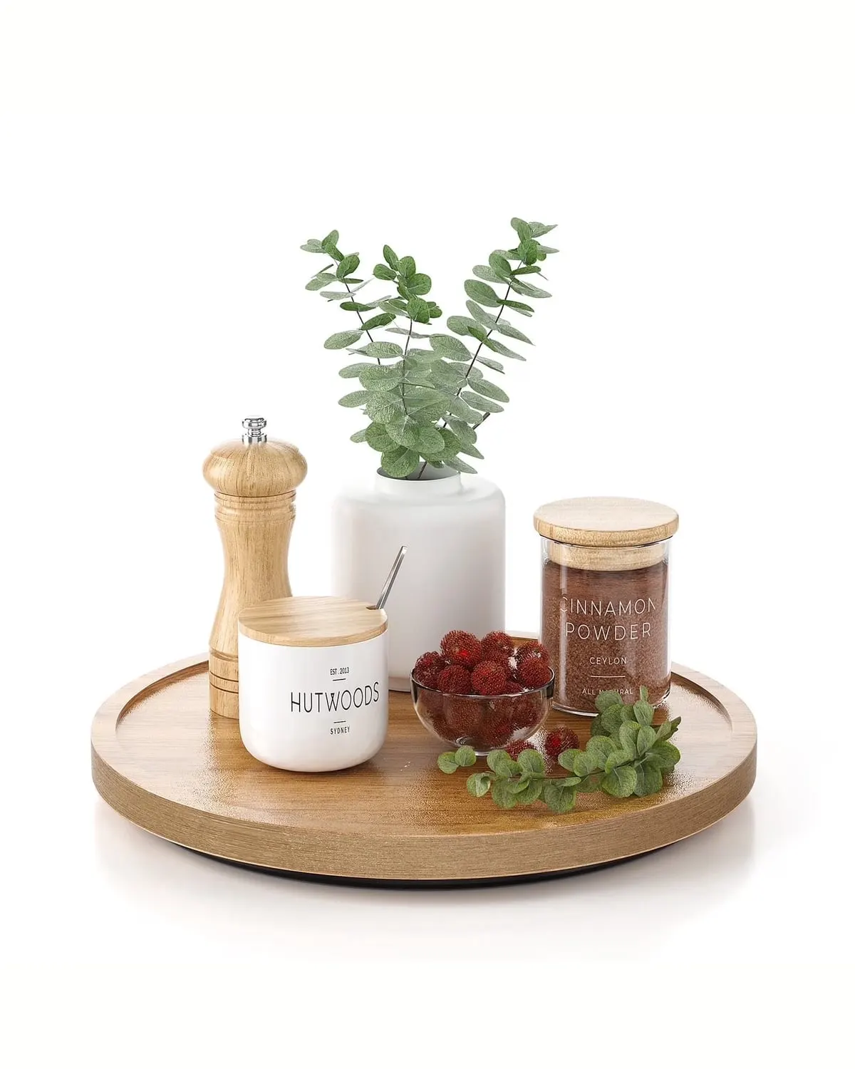 Round wooden lazy Susan turntable on a kitchen cabinet shelf